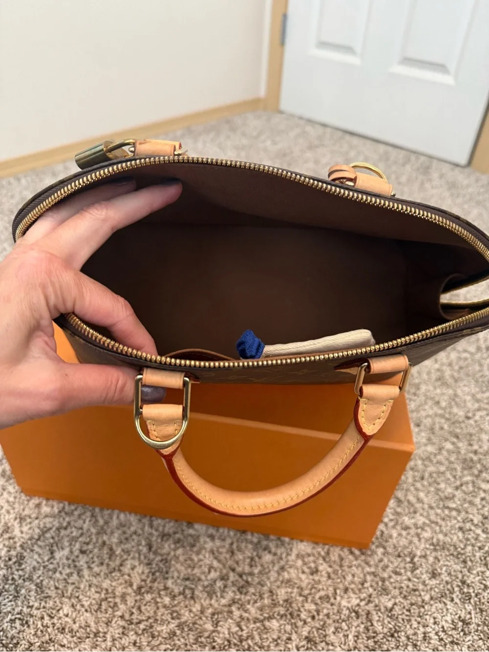 Louis Vuitton Monogram Alma Handbag in Brown and Tan